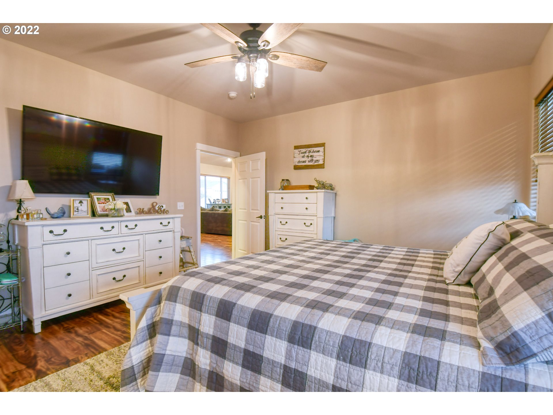 1918 Southwest 1st Street Pendleton, OR 97801 - Photo 18 of 30 a bedroom with a bed and a flat screen tv
