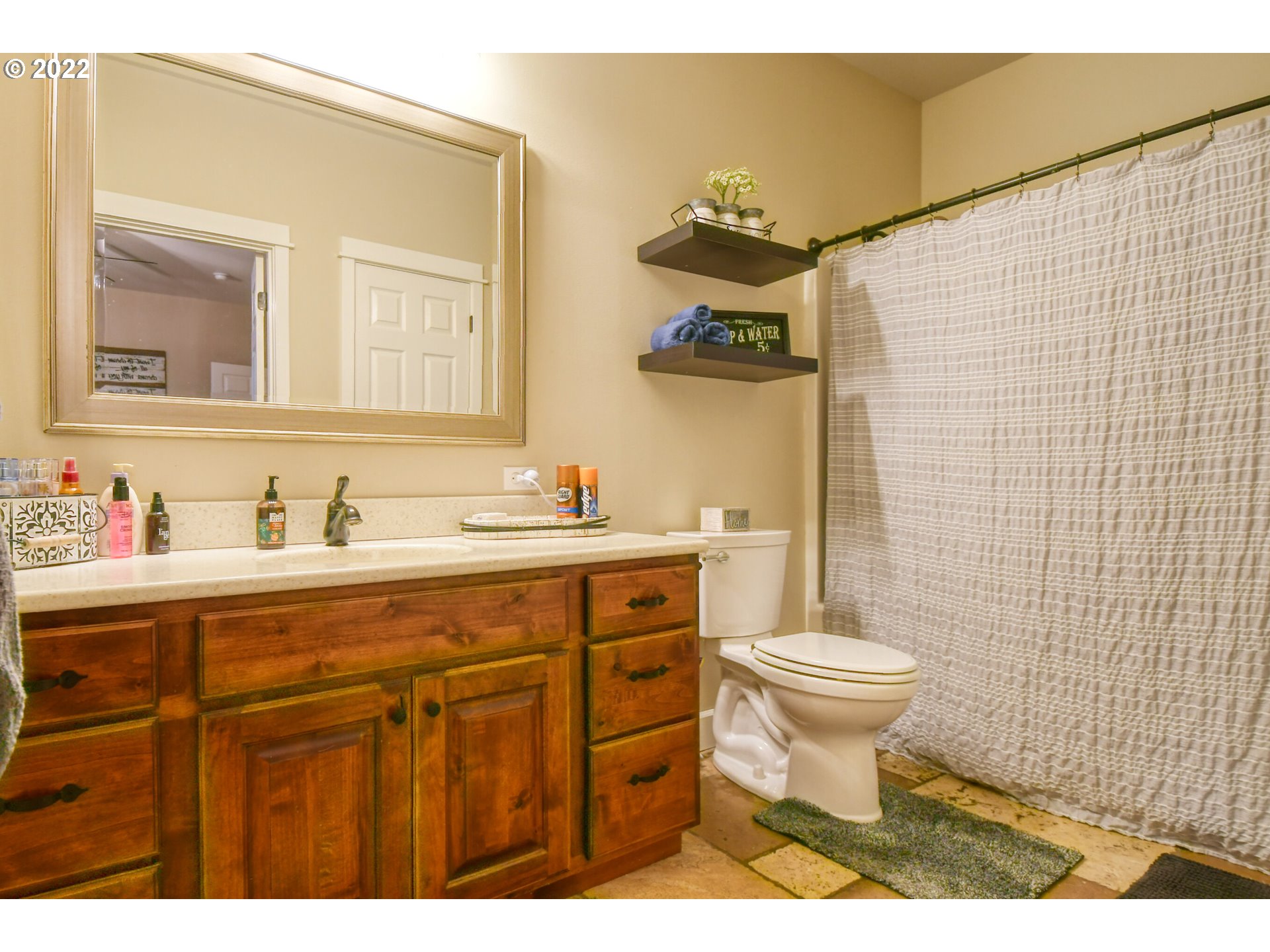 1918 Southwest 1st Street Pendleton, OR 97801 - Photo 19 of 30 a bathroom with a sink and a toilet