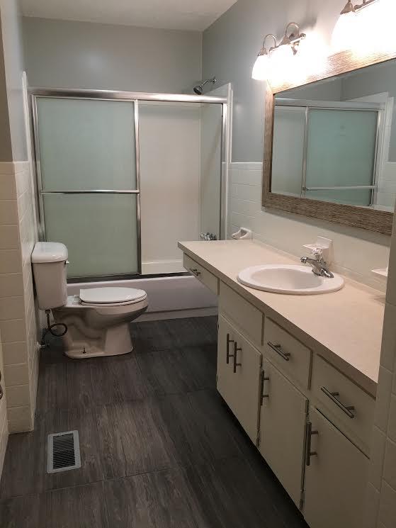 6056 Highway 76 East Springfield, TN 37172 - Photo 12 of 21 a bathroom with a sink toilet and mirror