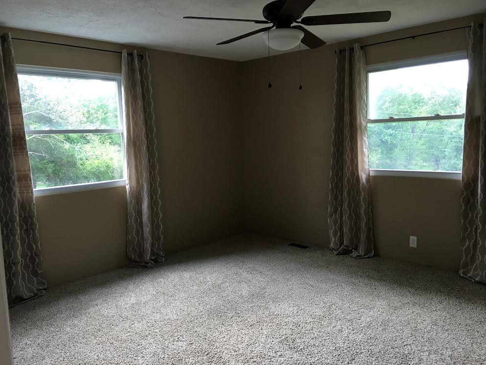 6056 Highway 76 East Springfield, TN 37172 - Photo 9 of 21 an empty room with a window