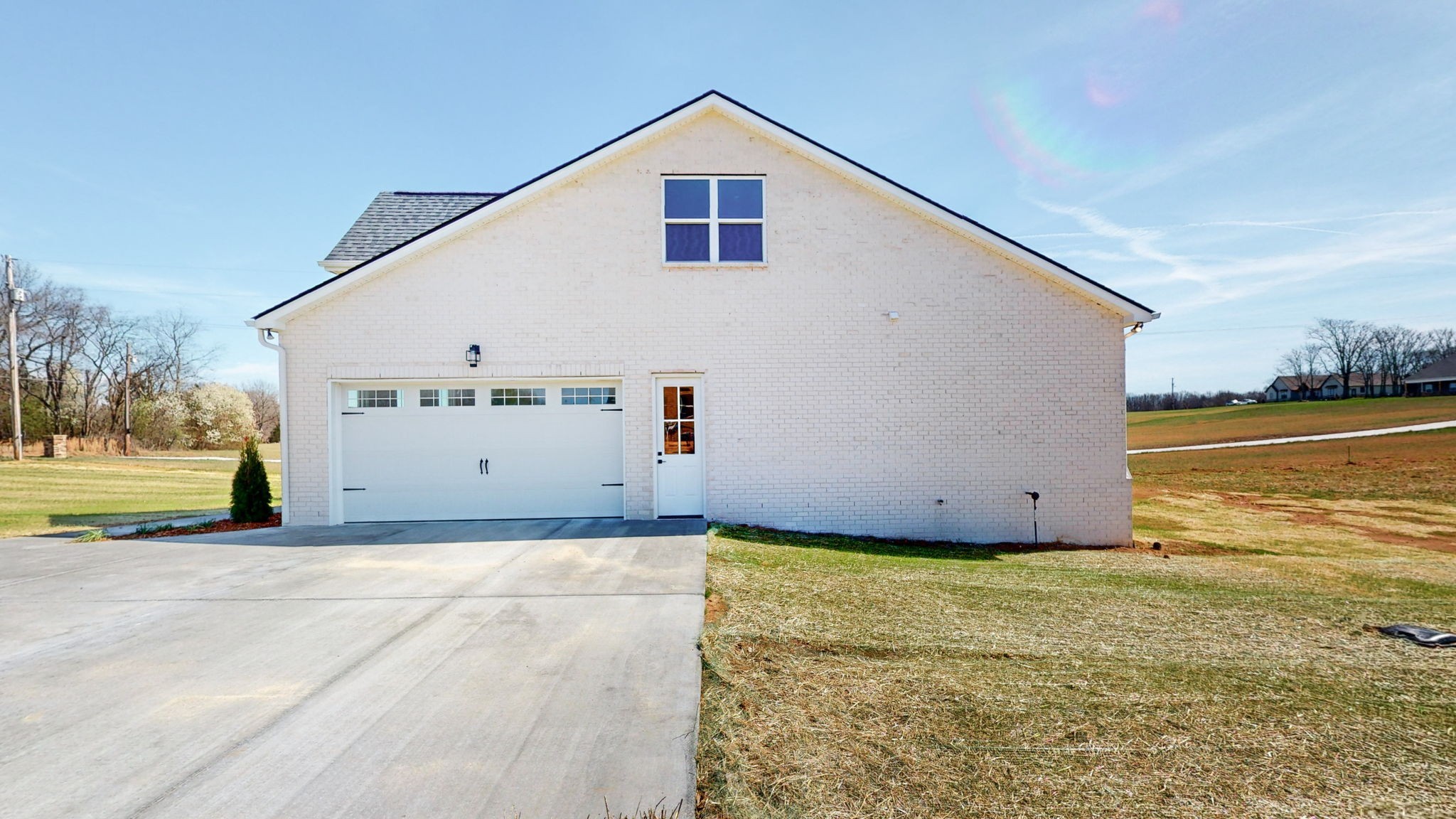 136 Aplin Branch Road Cottontown, TN 37048 - Photo 54 of 54 a view of a house with backyard