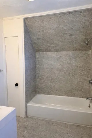 a bathroom with a bathtub