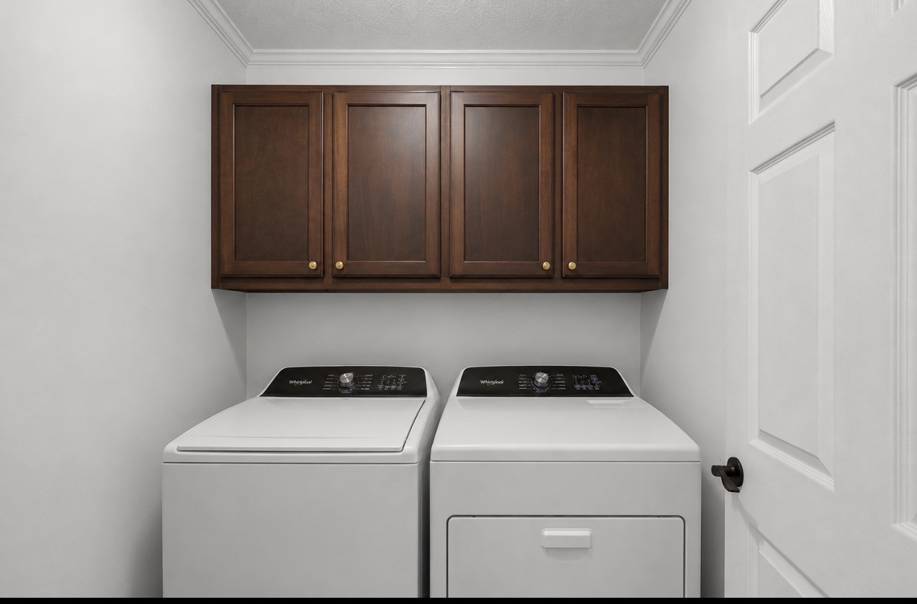 23 Matrix Cove Jackson, TN 38305 - Photo 16 of 16 a view of storage and utility room with washer and dryer