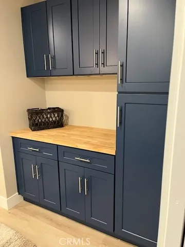 a kitchen with stainless steel appliances granite countertop cabinets and window