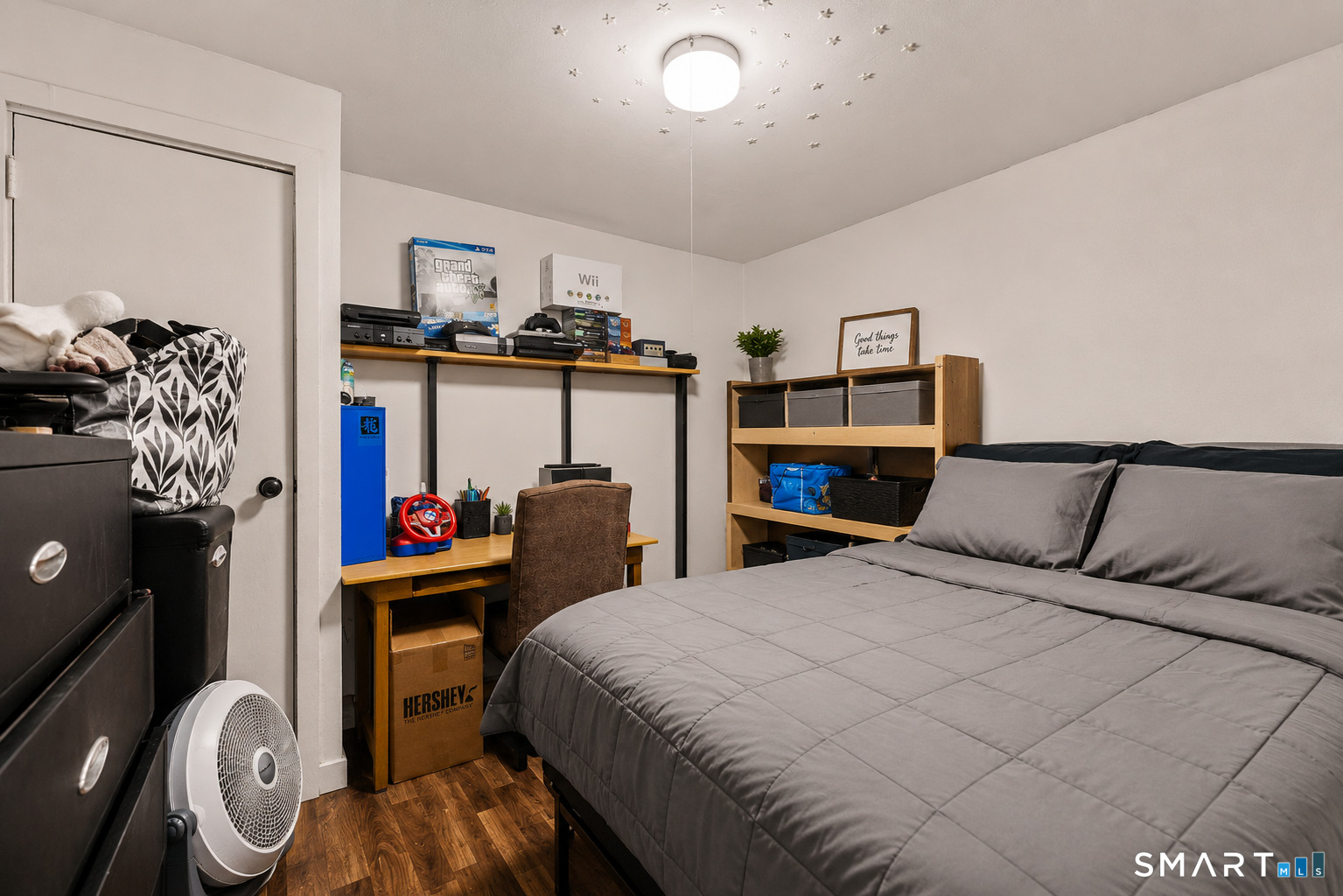 135 Prospect Street Waterbury, CT 06710 - Photo 9 of 19 a bed room with a bed and dresser
