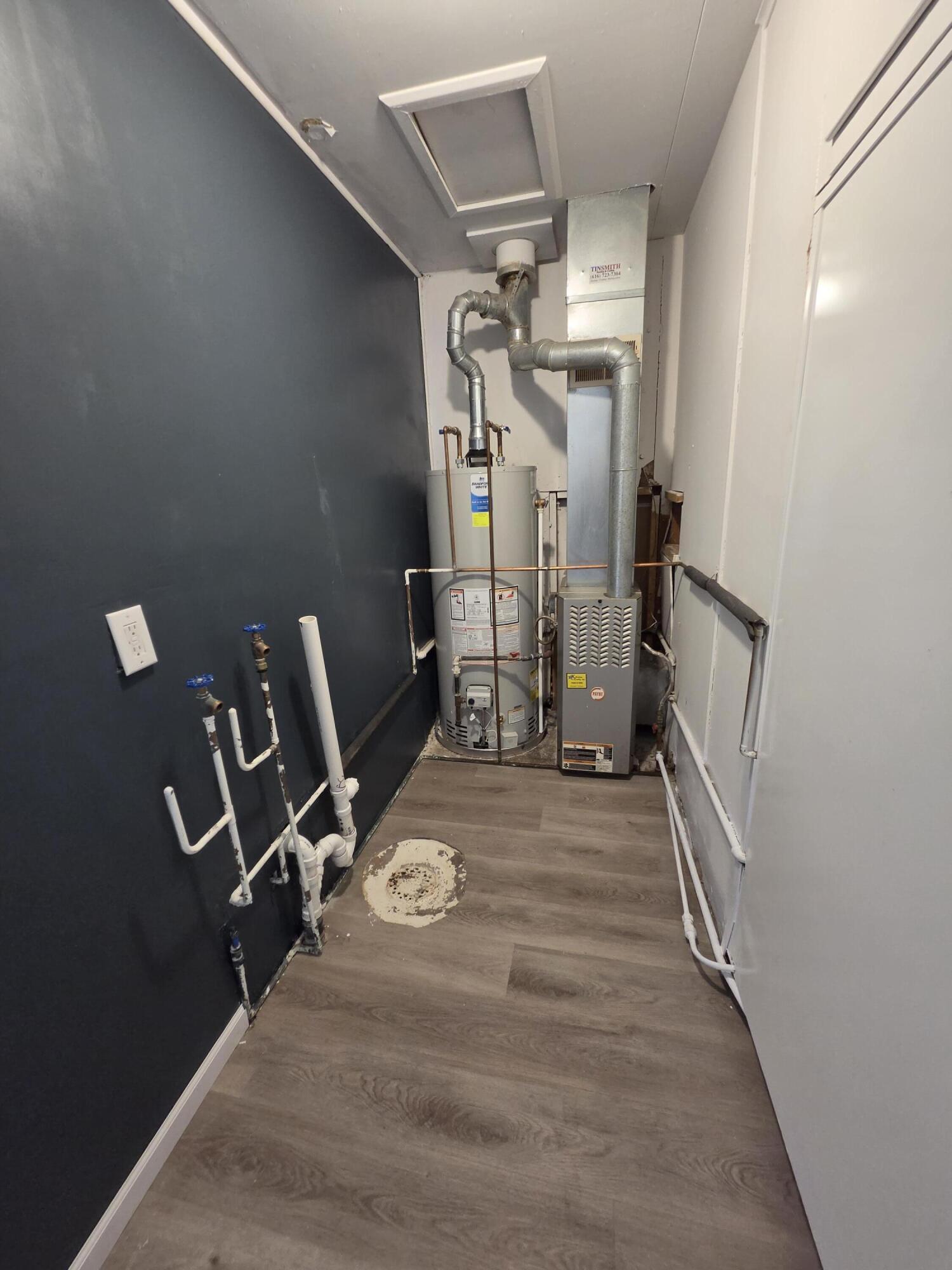 2167 Austin Street Muskegon, MI 49444 - Photo 20 of 24 laundry space and storage to the right