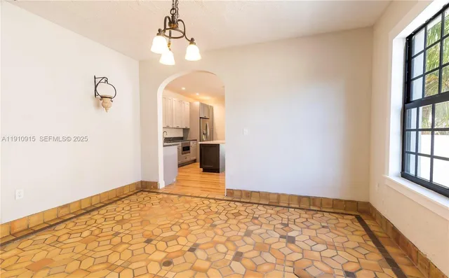 a view of an empty room and window