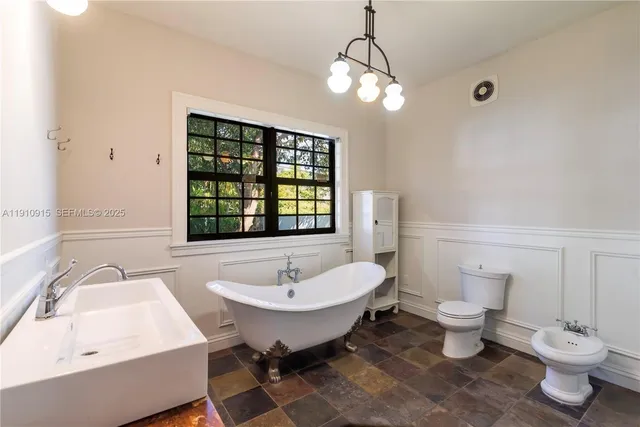 a bathroom with a sink and a toilet