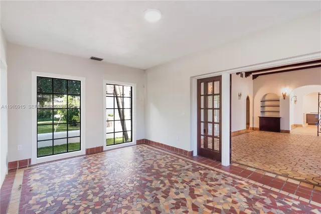 an empty room with windows