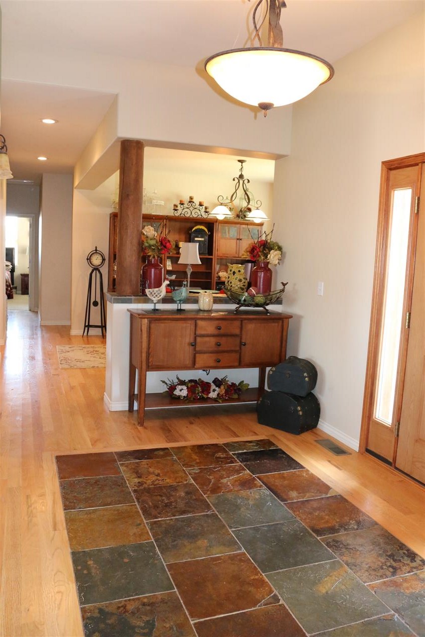 755 R Road Mack, CO 81525 - Photo 12 of 41 a room with gym equipment and a large window