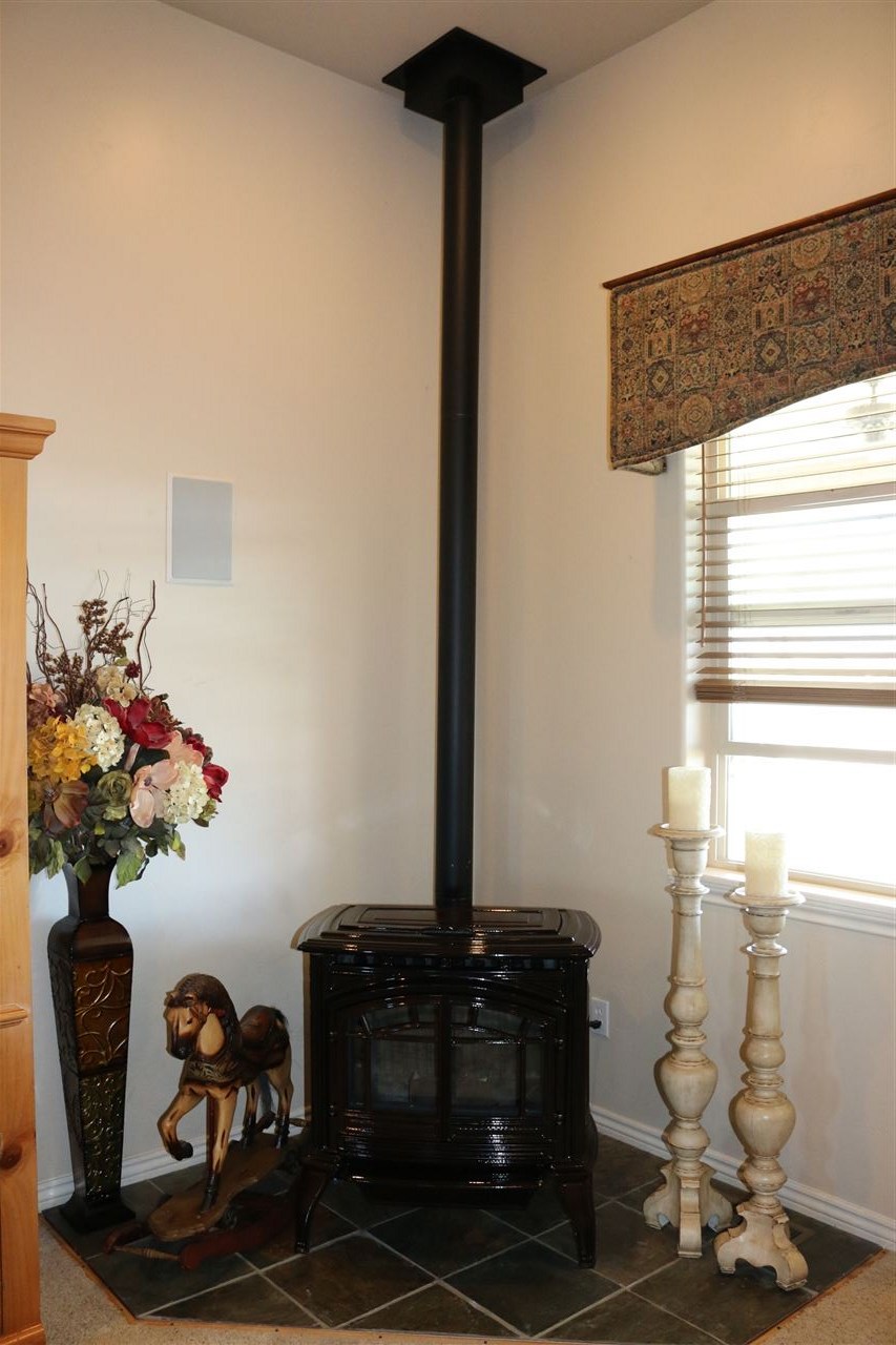 755 R Road Mack, CO 81525 - Photo 26 of 41 a table with a vase and flowers on it