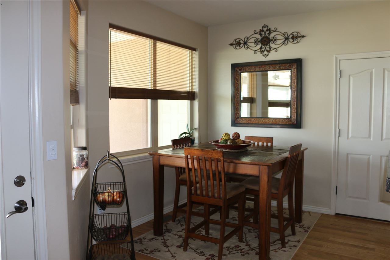 755 R Road Mack, CO 81525 - Photo 27 of 41 a view of a dining room with furniture and wooden floor