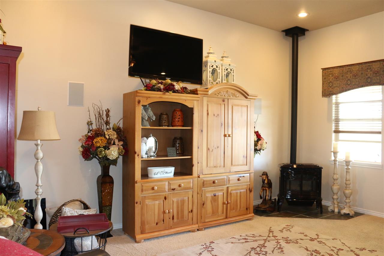755 R Road Mack, CO 81525 - Photo 8 of 41 a living room with furniture and a flat screen tv