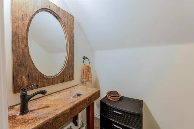 a outdoor space with patio furniture and a fireplace