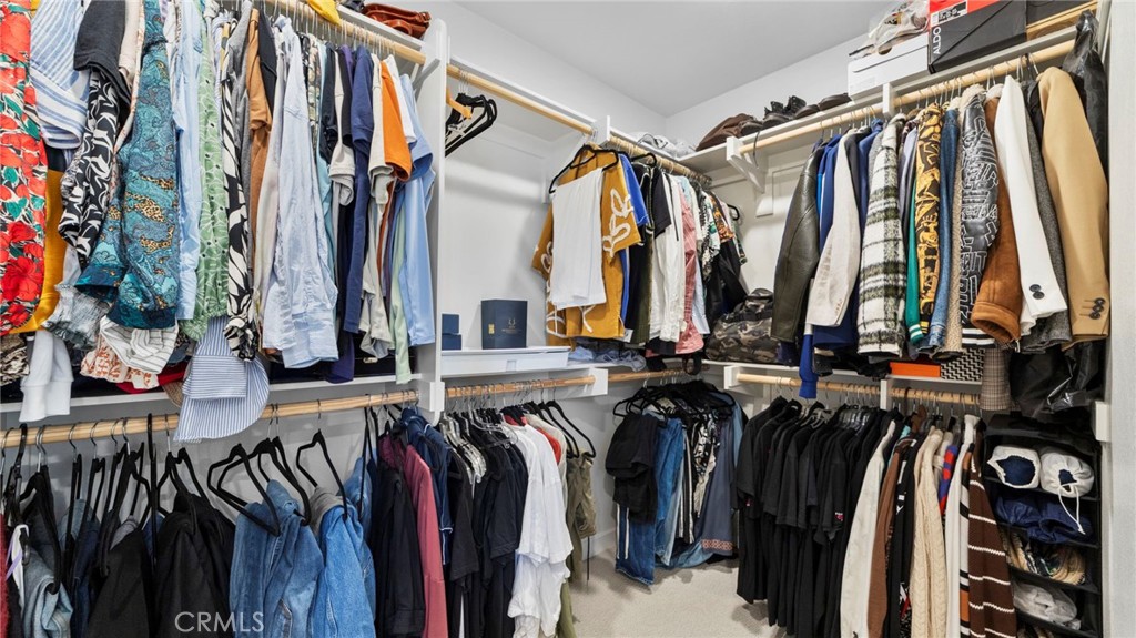 104 Lipizzan Lane Fallbrook, CA 92028 - Photo 33 of 53 a view of walk in closet with clothes and shoes