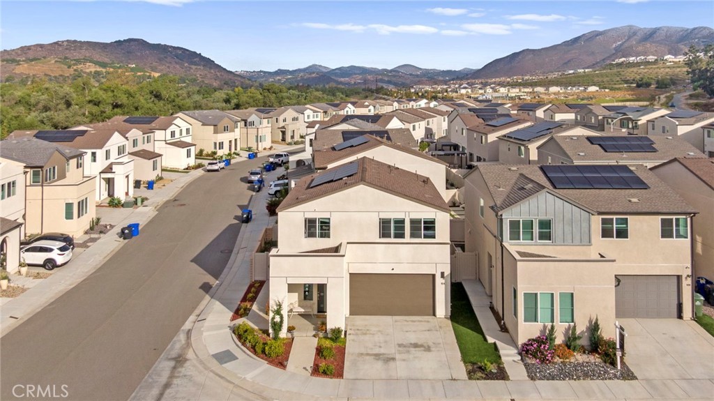 104 Lipizzan Lane Fallbrook, CA 92028 - Photo 39 of 53 a view of a city with a mountain