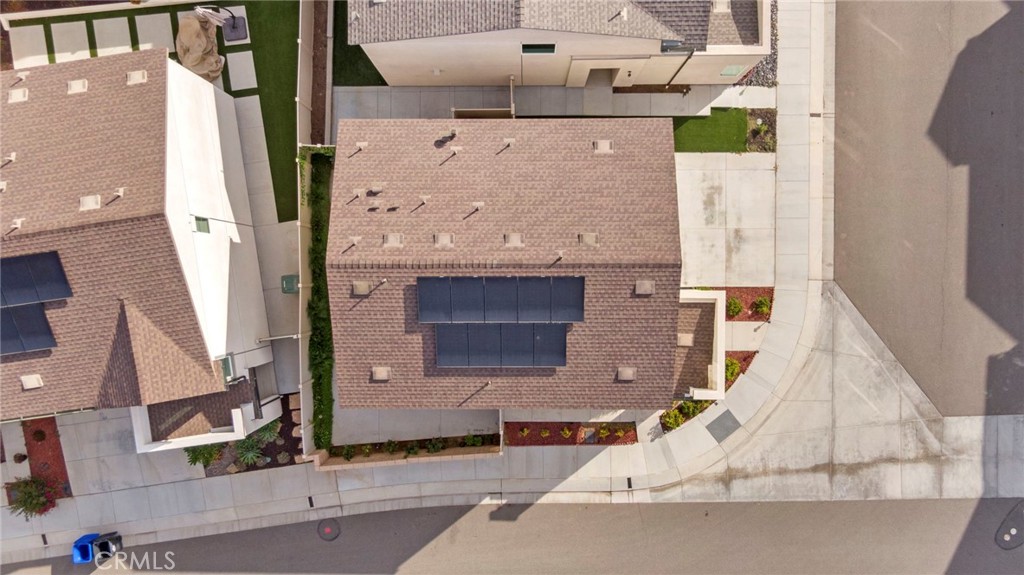 104 Lipizzan Lane Fallbrook, CA 92028 - Photo 43 of 53 an aerial view of a house with a fireplace and potted plants