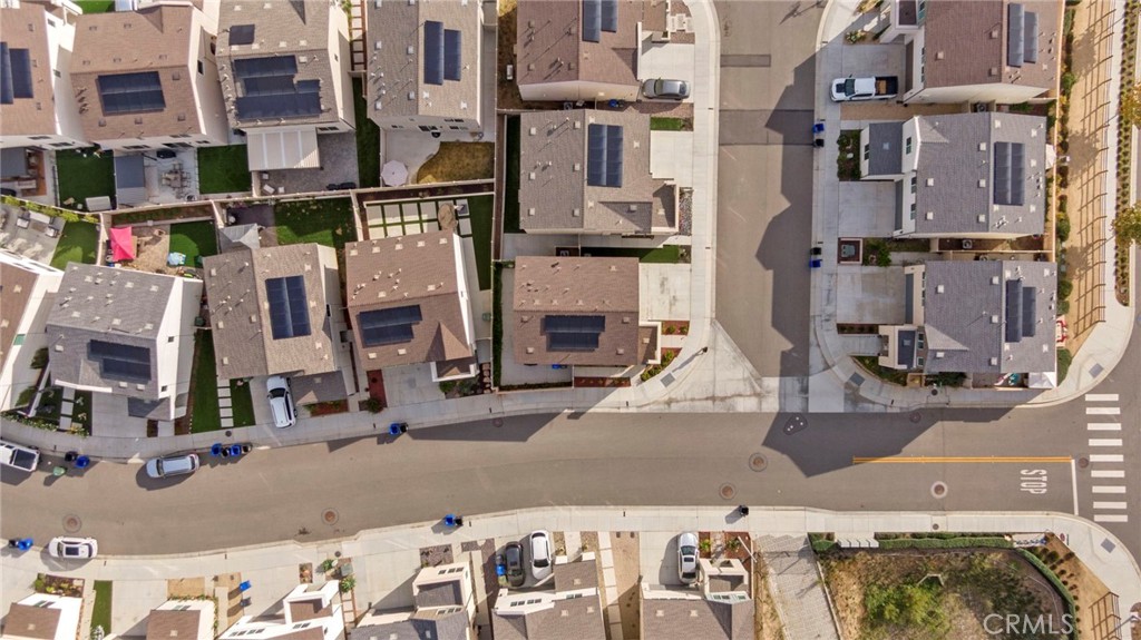 104 Lipizzan Lane Fallbrook, CA 92028 - Photo 44 of 53 a city street lined with tall buildings