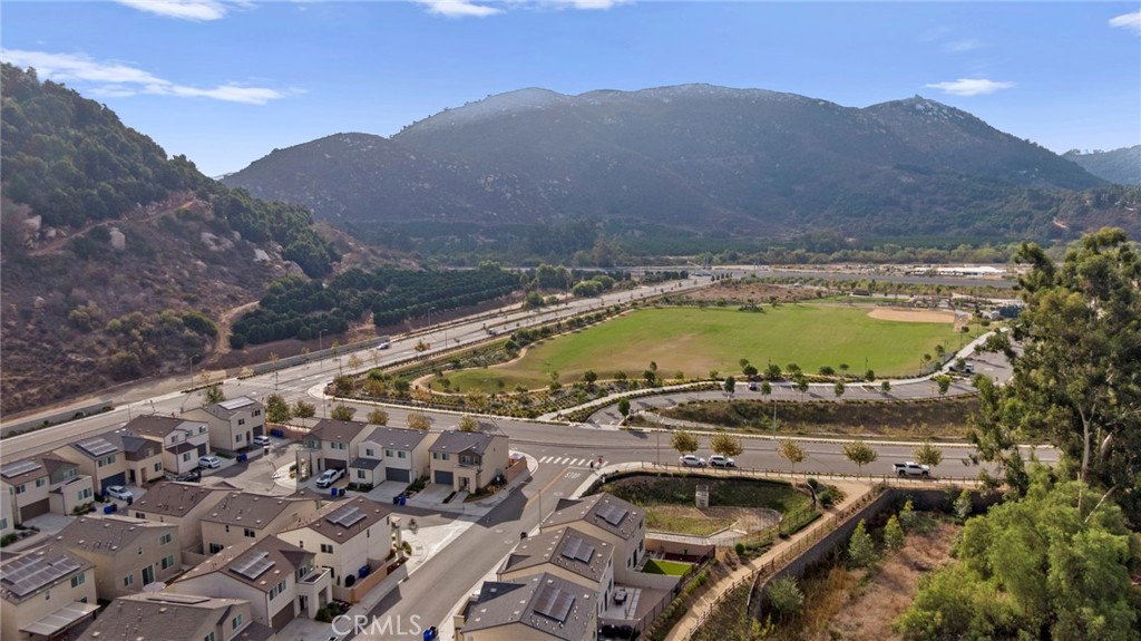 104 Lipizzan Lane Fallbrook, CA 92028 - Photo 46 of 53 a view of a swimming pool with a mountain