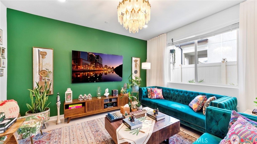 104 Lipizzan Lane Fallbrook, CA 92028 - Photo 5 of 53 a living room with furniture and a flat screen tv