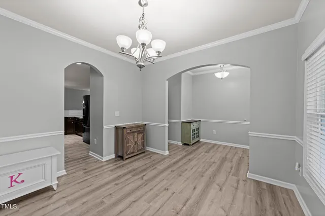 an aerial view of a house with outdoor space