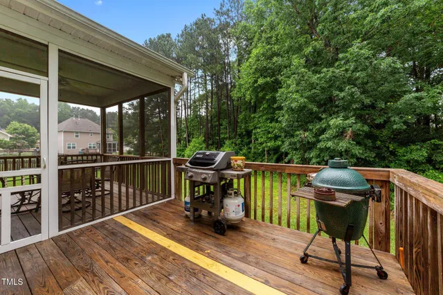 a view of a balcony with furniture