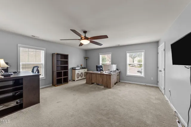 a view of a balcony with chairs