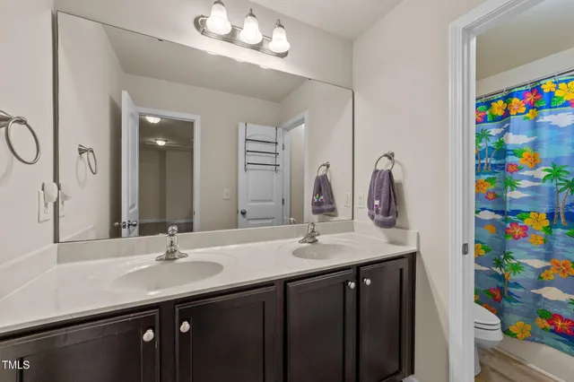 a workspace with furniture and ceiling fan