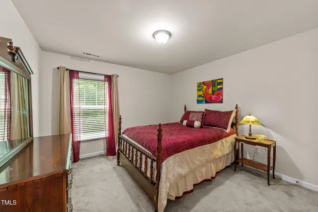 a bathroom with a sink a vanity and a mirror