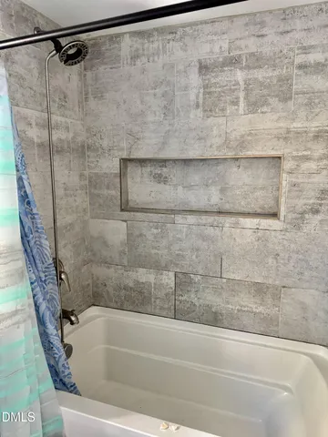 a bathroom with a bathtub