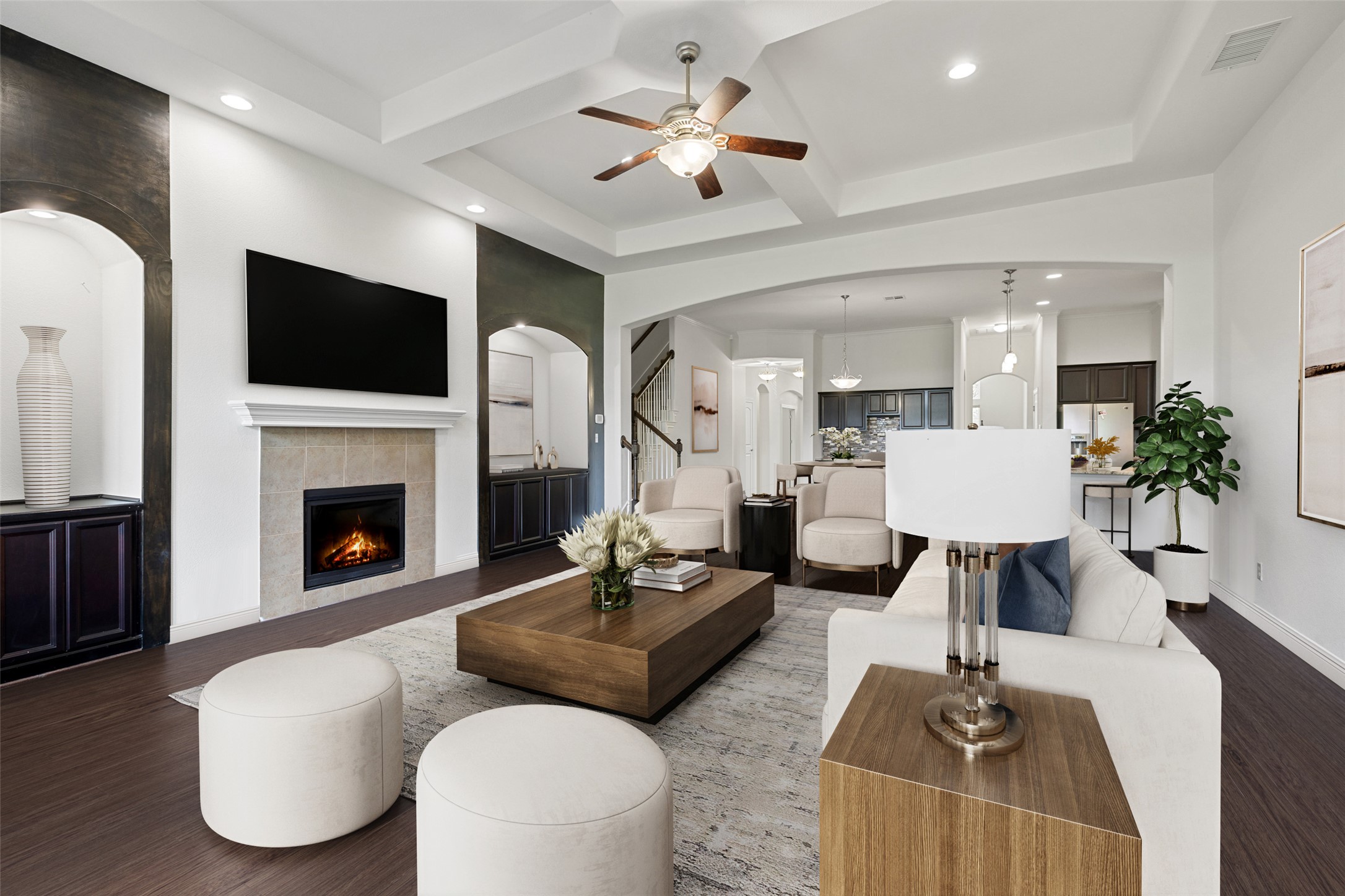 5612 Cherokee Draw Road Austin, TX 78738 - Photo 13 of 31 a living room with furniture a fireplace and a flat screen tv
