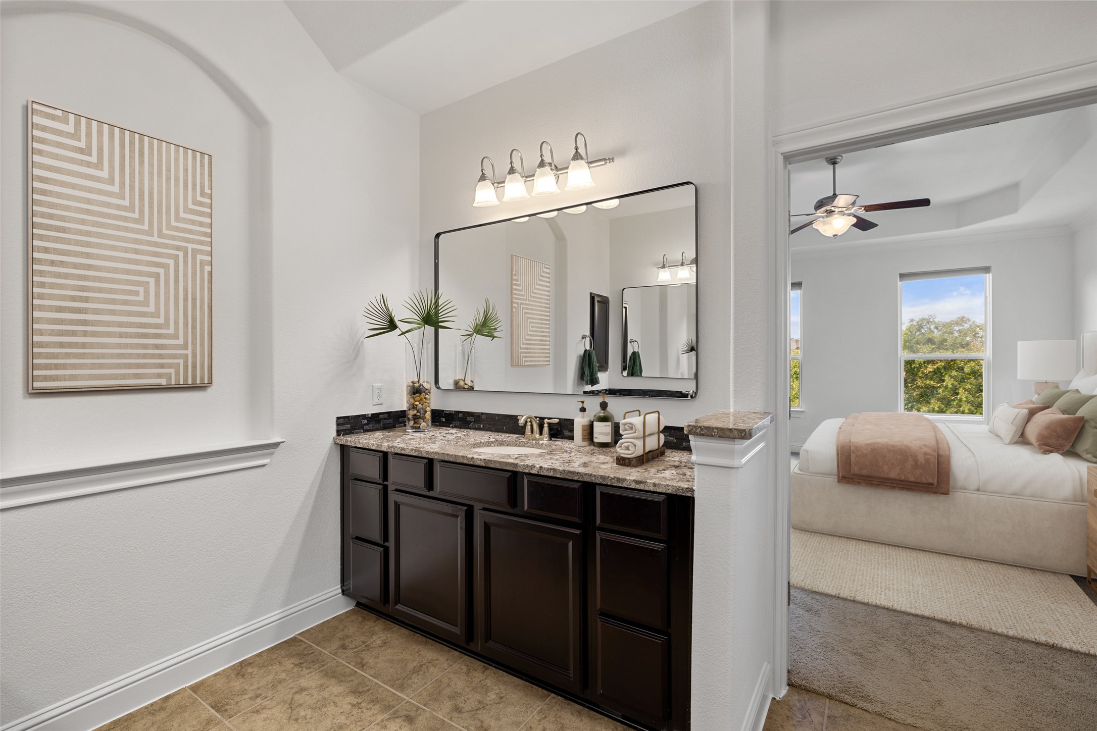 5612 Cherokee Draw Road Austin, TX 78738 - Photo 15 of 31 a bathroom with a double vanity sink and a mirror