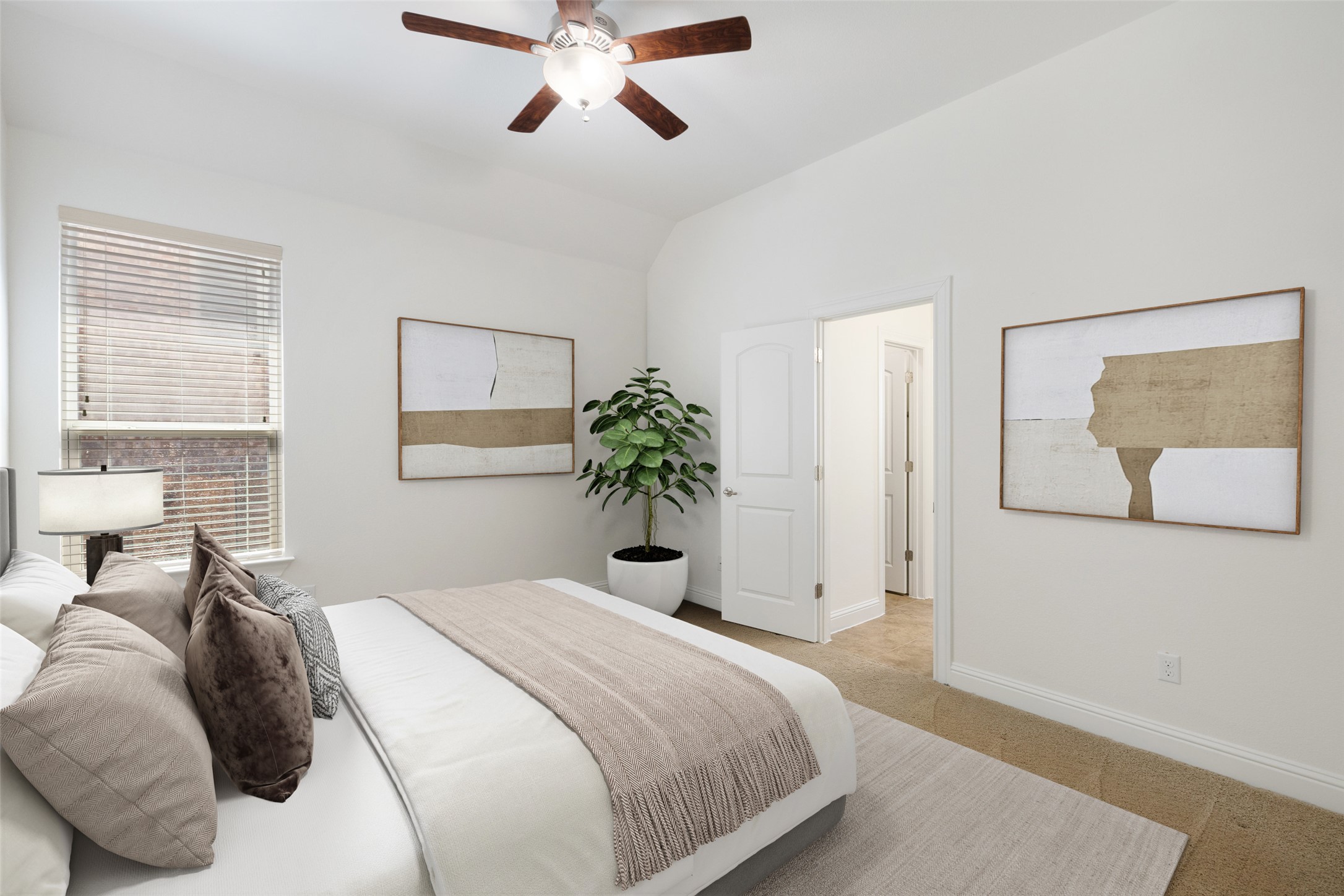 5612 Cherokee Draw Road Austin, TX 78738 - Photo 18 of 31 a bedroom with a large bed and a chandelier