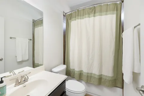 a bathroom with a sink and toilet