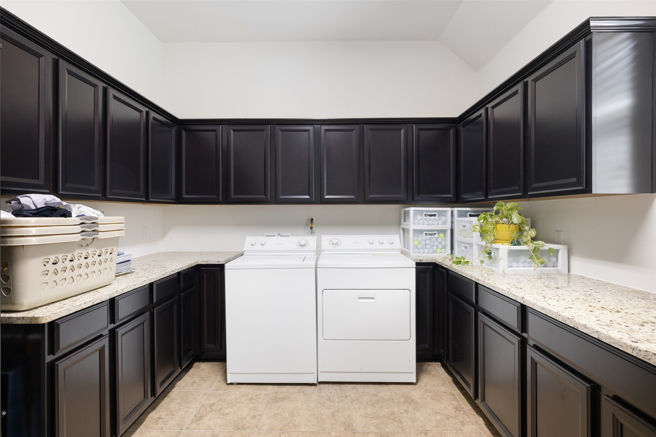 5612 Cherokee Draw Road Austin, TX 78738 - Photo 25 of 31 a kitchen with stainless steel appliances granite countertop a sink stove and refrigerator