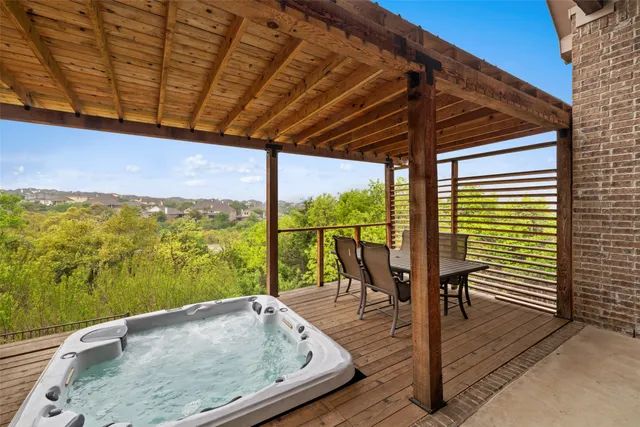 a view of a balcony with lake view and a ocean view