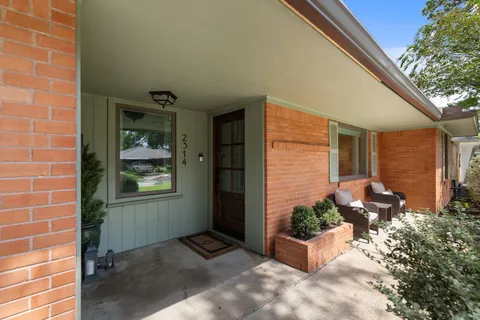 a view of a entryway door front of house