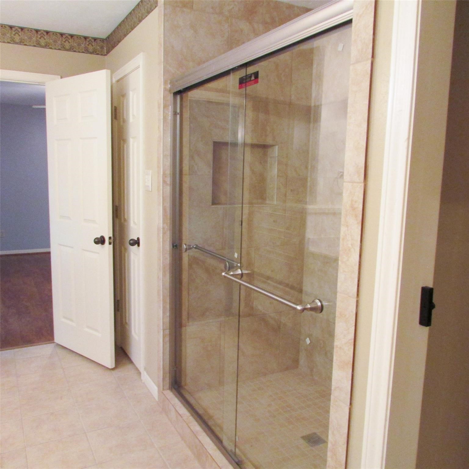 2232 Azalea Circle Huntsville, TX 77340 - Photo 12 of 24 Primary bath walk-in shower