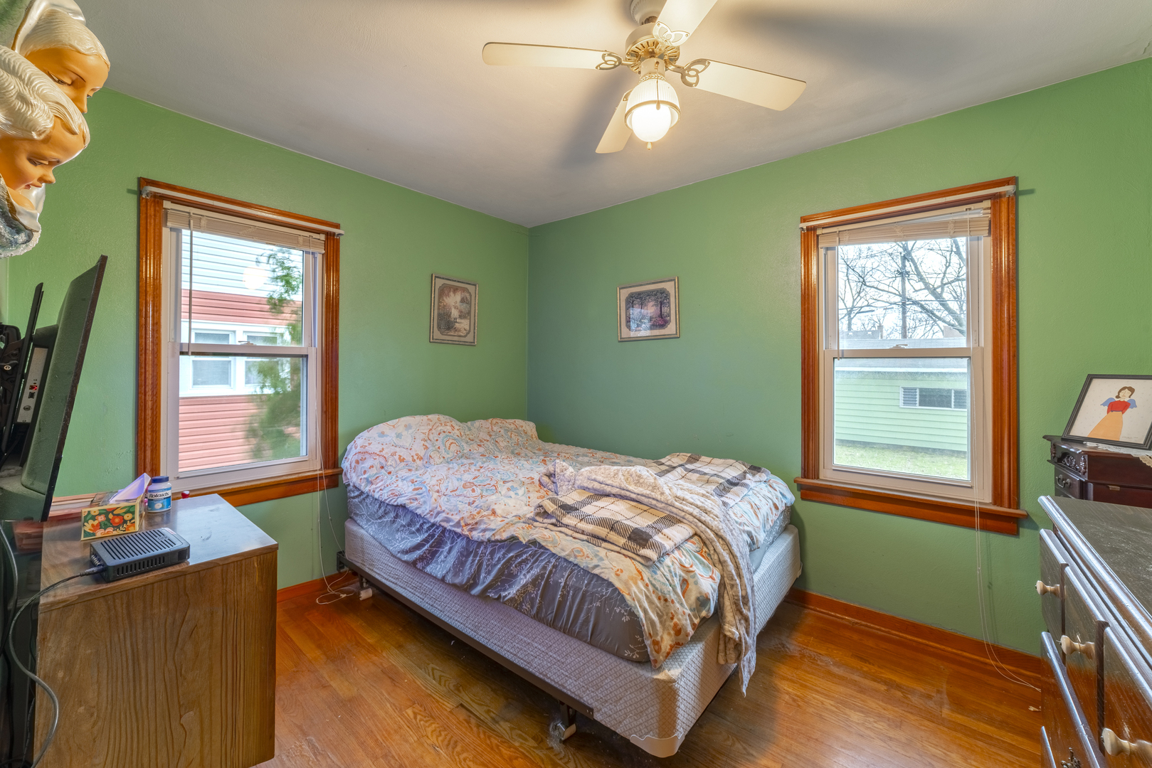 17949 Escanaba Avenue Lansing, IL 60438 - Photo 18 of 45 a bedroom with a bed and a window