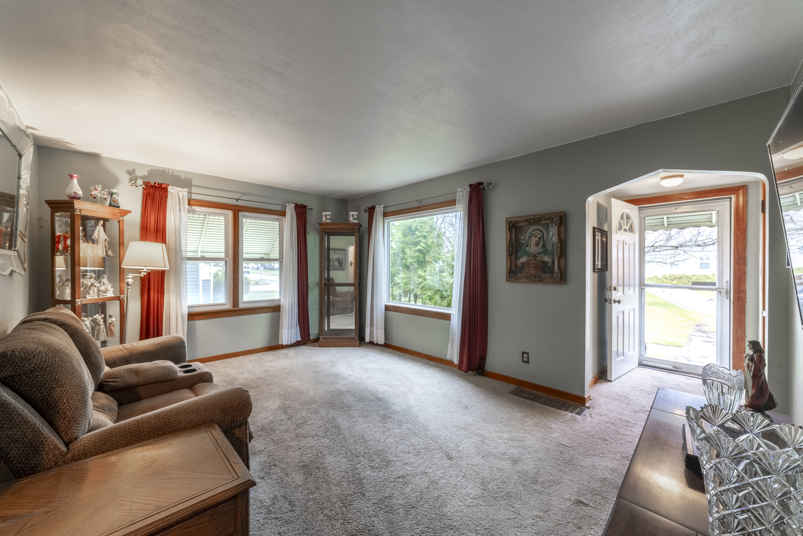 17949 Escanaba Avenue Lansing, IL 60438 - Photo 2 of 45 a living room with furniture and a large window