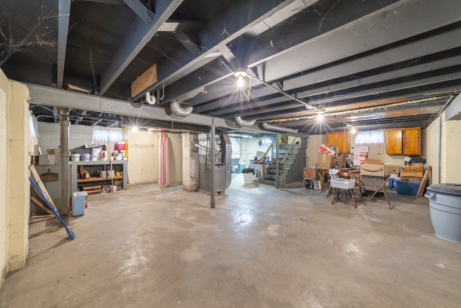17949 Escanaba Avenue Lansing, IL 60438 - Photo 29 of 45 a view of a big room with air conditioner duct and materials on floor