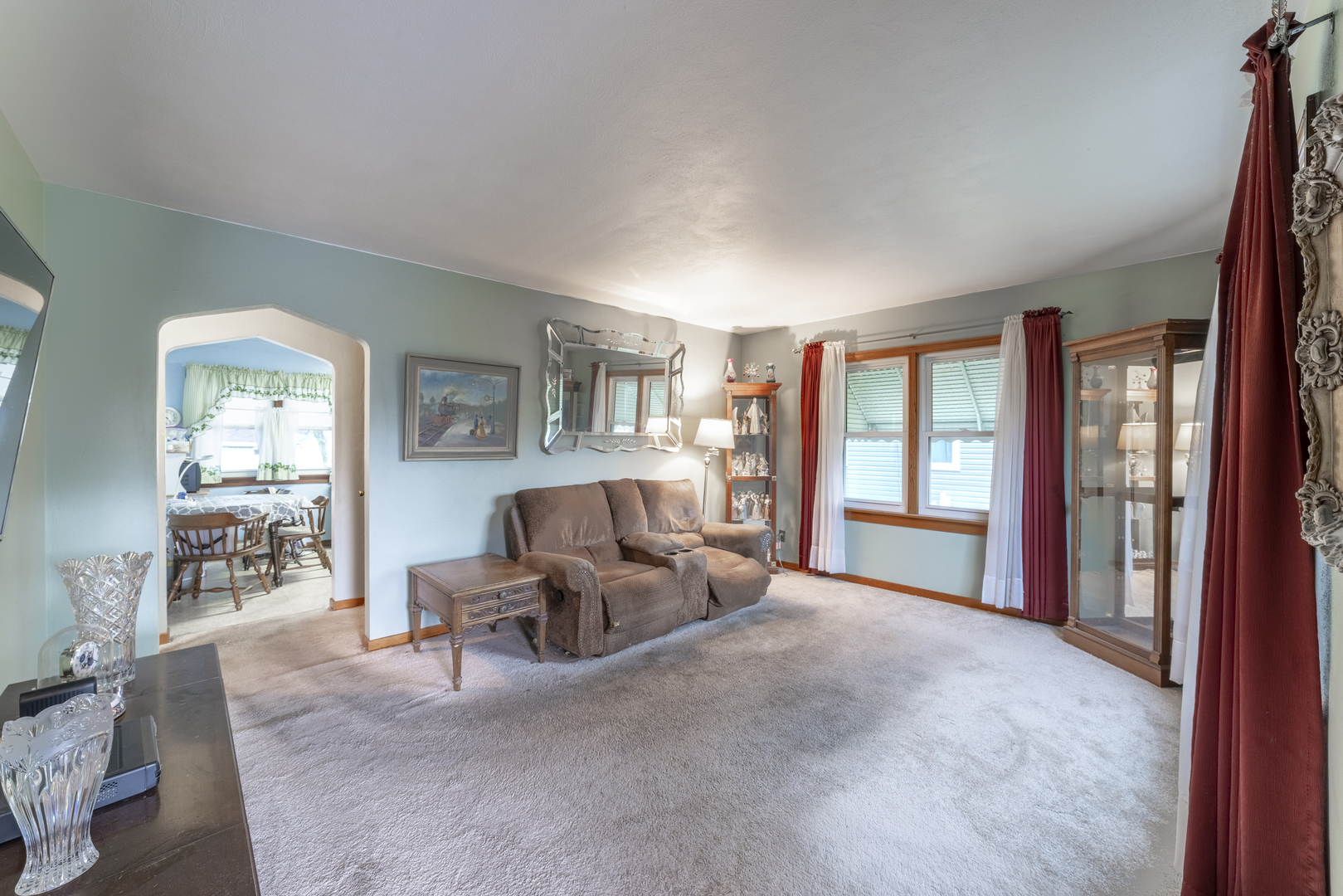 17949 Escanaba Avenue Lansing, IL 60438 - Photo 3 of 45 a living room with furniture and a window