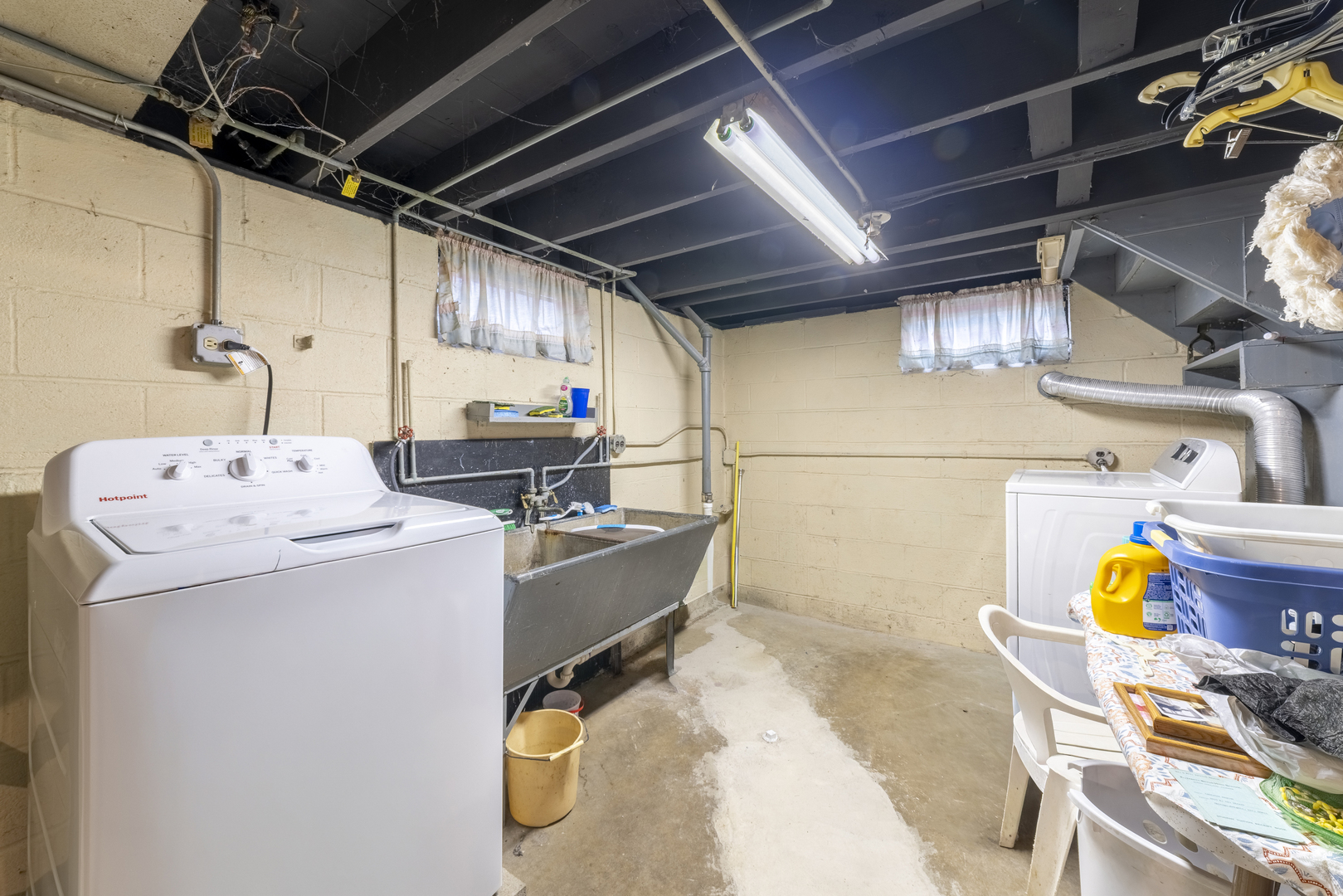 17949 Escanaba Avenue Lansing, IL 60438 - Photo 31 of 45 a utility room with dryer and washer