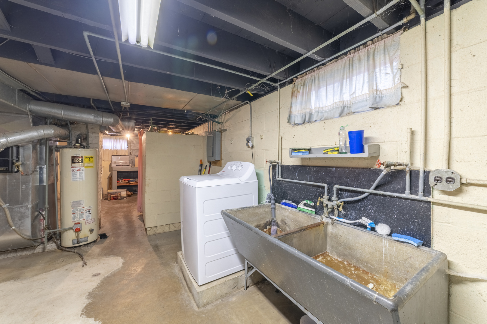 17949 Escanaba Avenue Lansing, IL 60438 - Photo 32 of 45 a room with storage and utility