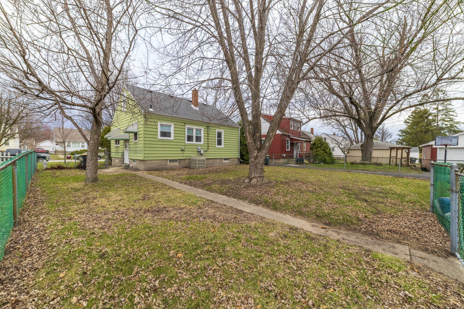 17949 Escanaba Avenue Lansing, IL 60438 - Photo 37 of 45 a house with trees in front of it
