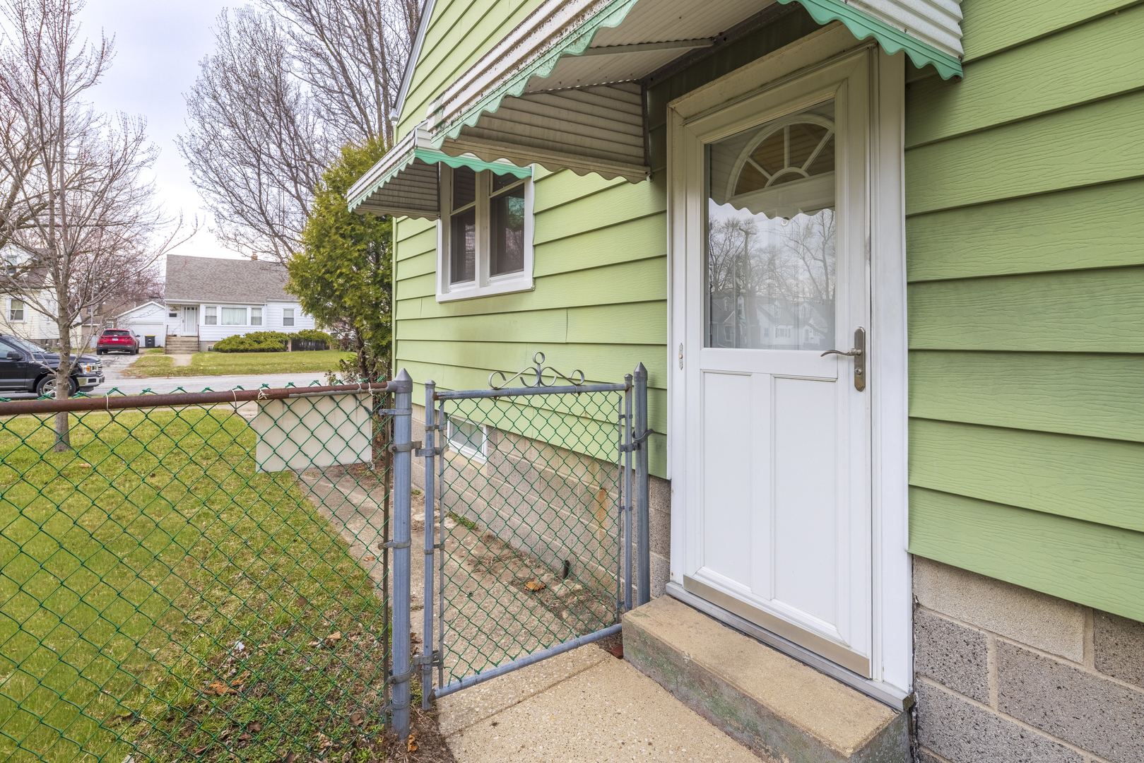 17949 Escanaba Avenue Lansing, IL 60438 - Photo 40 of 45 a view of a gate of a house
