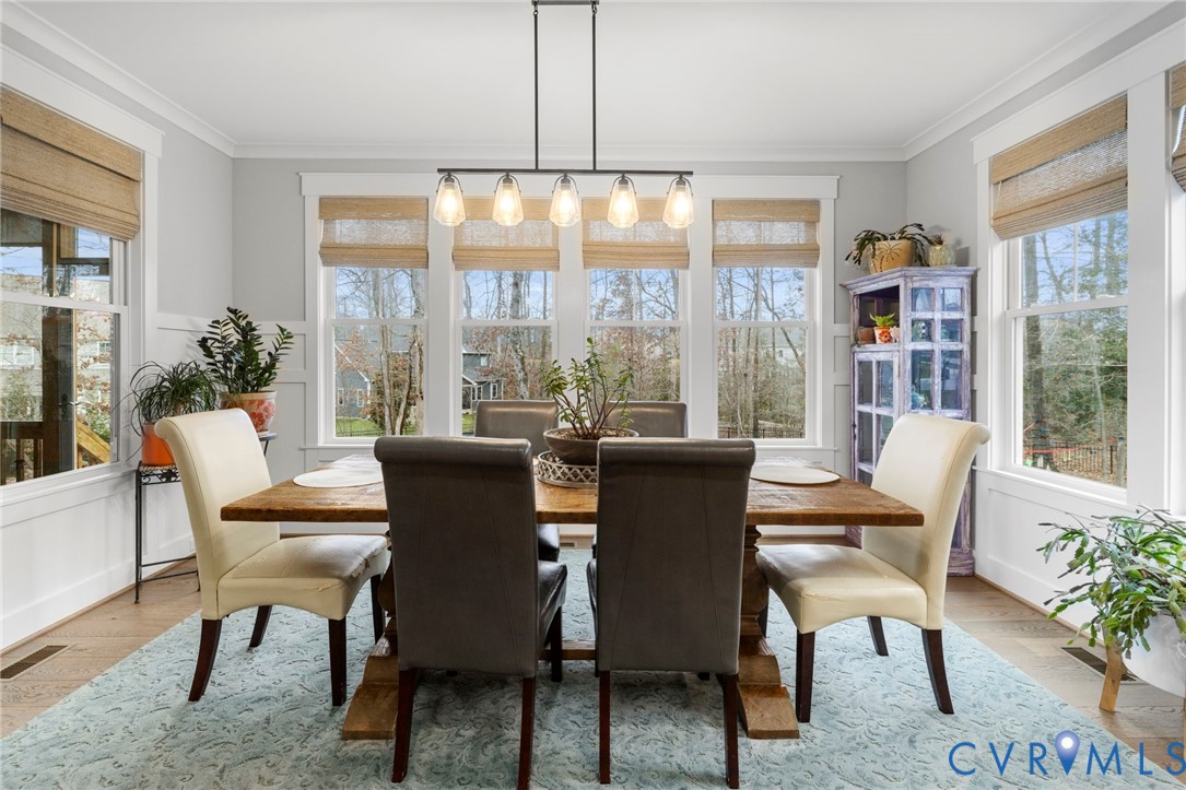 15060 Dordon Lane Midlothian, VA 23112 - Photo 13 of 35 a dining room with furniture mountain view and balcony