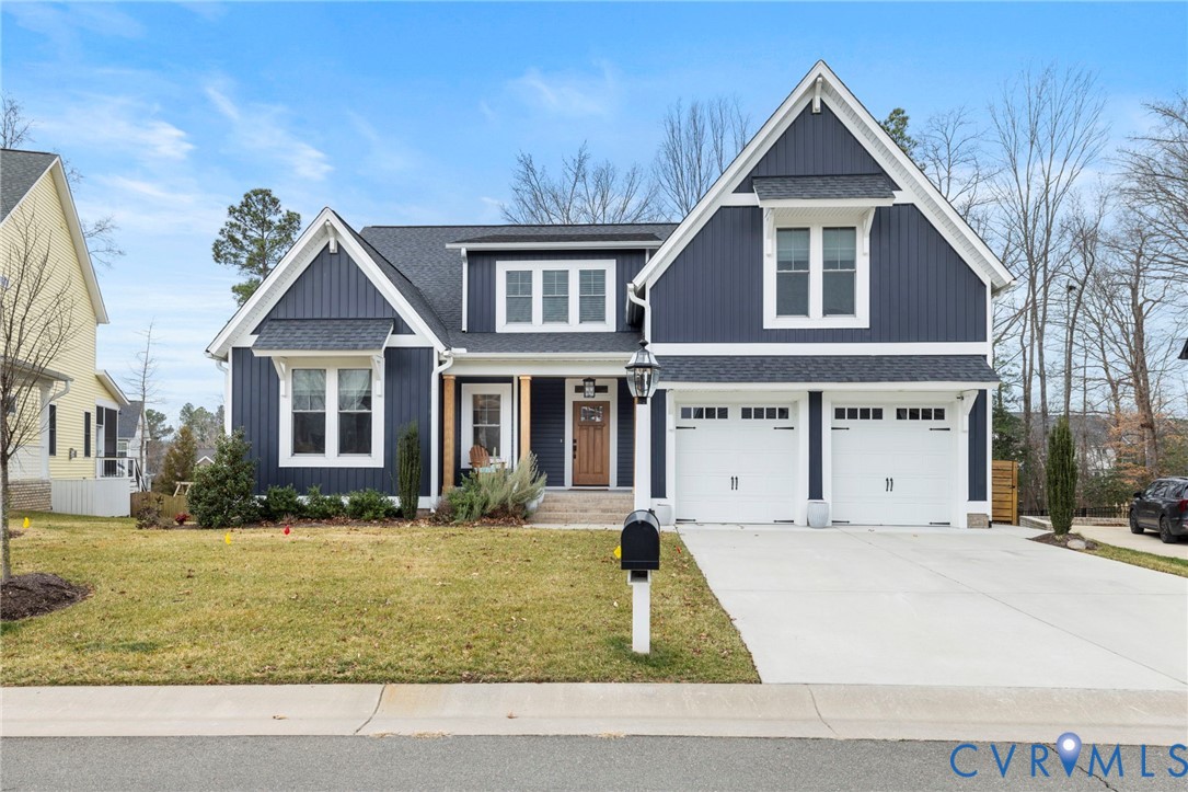 15060 Dordon Lane Midlothian, VA 23112 - Photo 2 of 35 a front view of a house with a yard