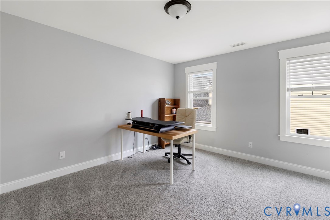 15060 Dordon Lane Midlothian, VA 23112 - Photo 26 of 35 a view of a workspace with furniture and a window