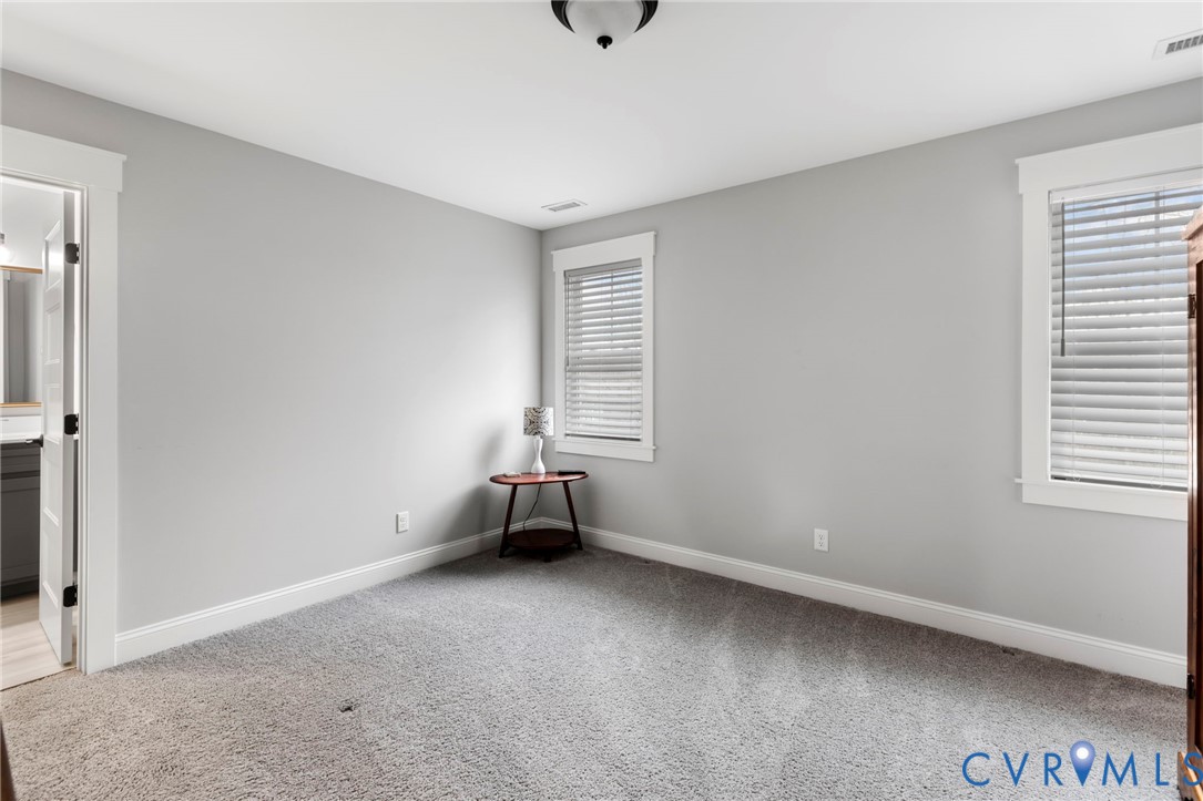 15060 Dordon Lane Midlothian, VA 23112 - Photo 28 of 35 a view of room with window and a ceiling fan
